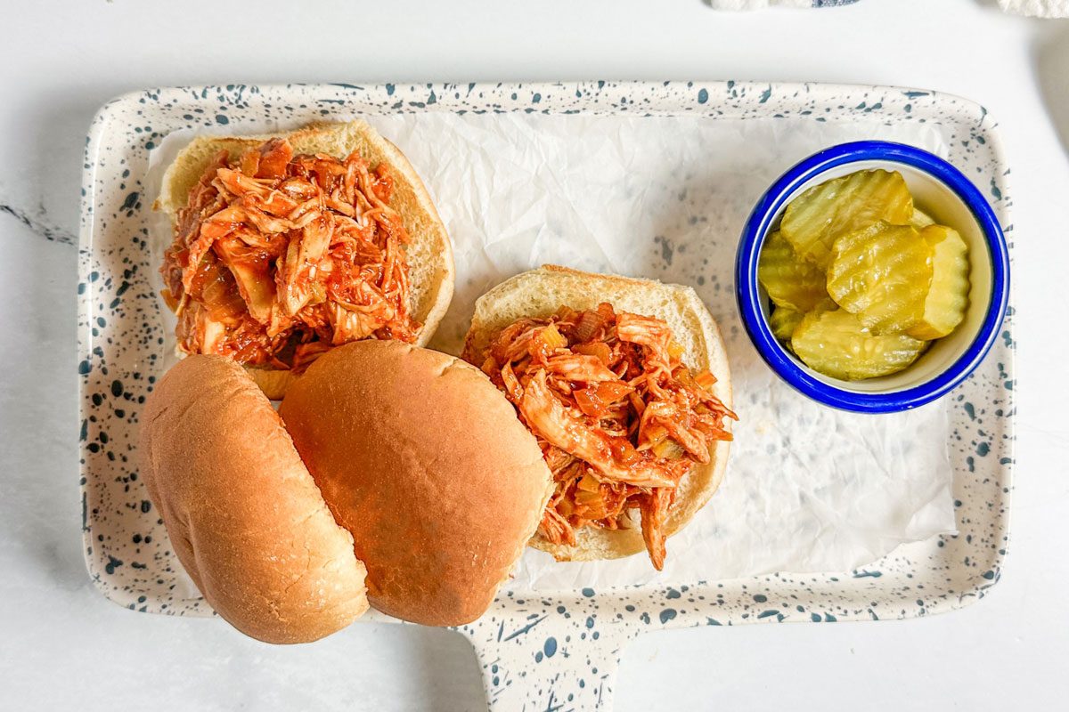 Taste of Home Barbecue Chicken Sandwich on a speckled enamel tray