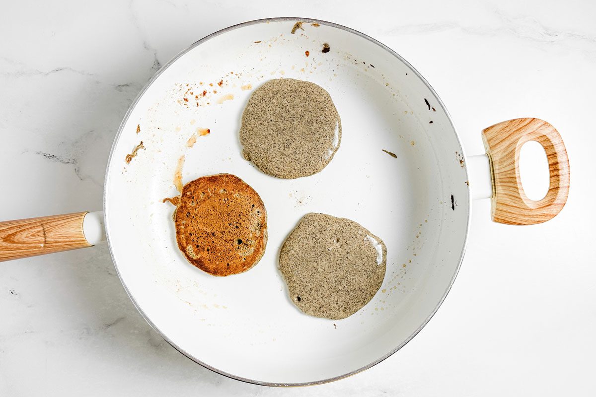 Taste Of Home Buckwheat Pancakes On A White Skillet