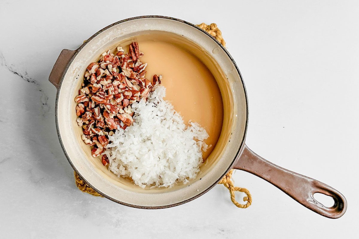 Filling ingredients for Taste of Home Butterscotch Cake in a ceramic saucepan