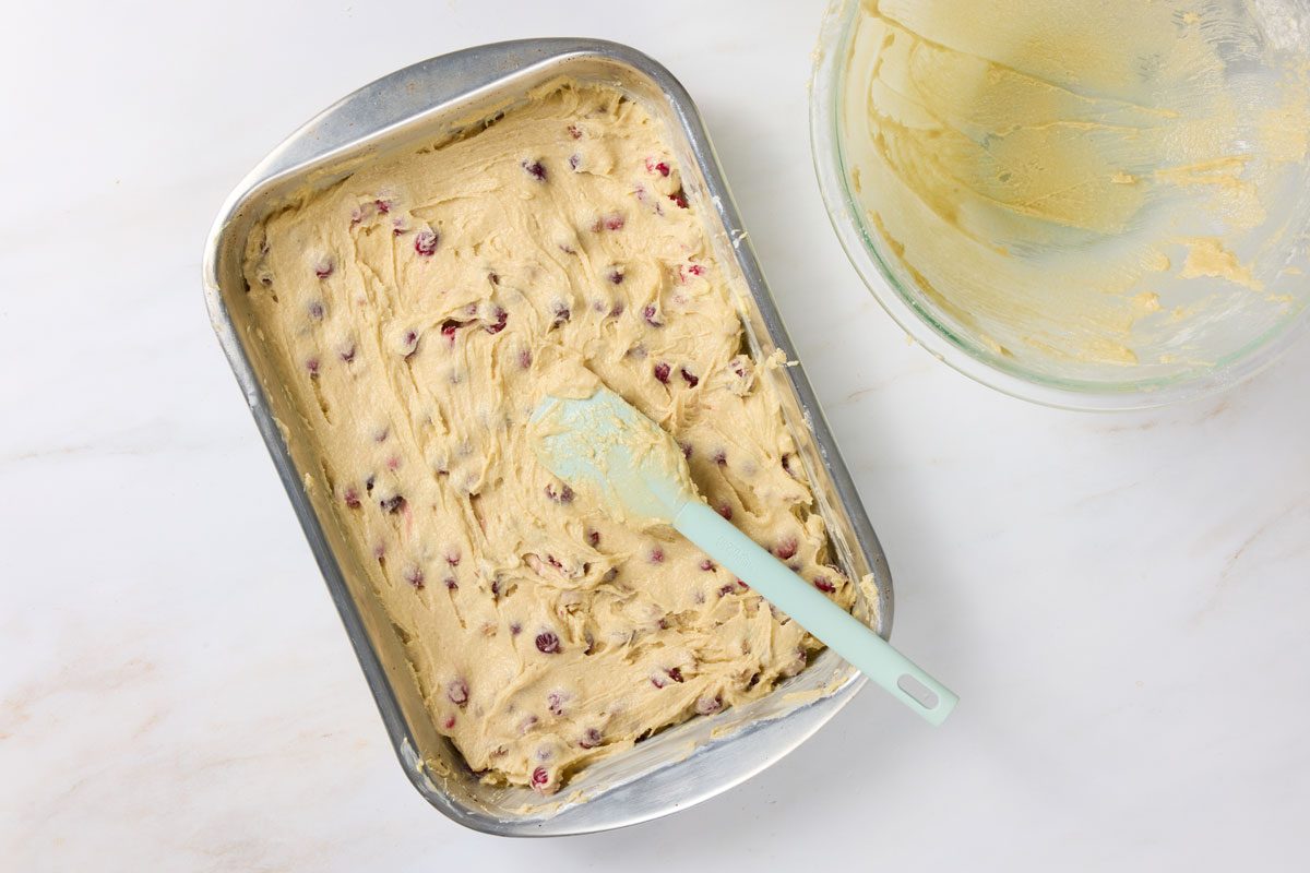 pour into greased tin