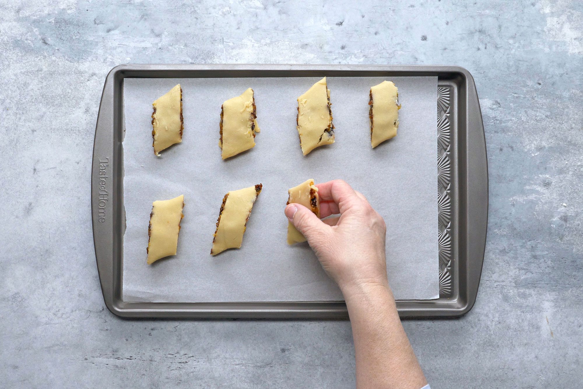 Place seam side down on parchment-lined baking sheets