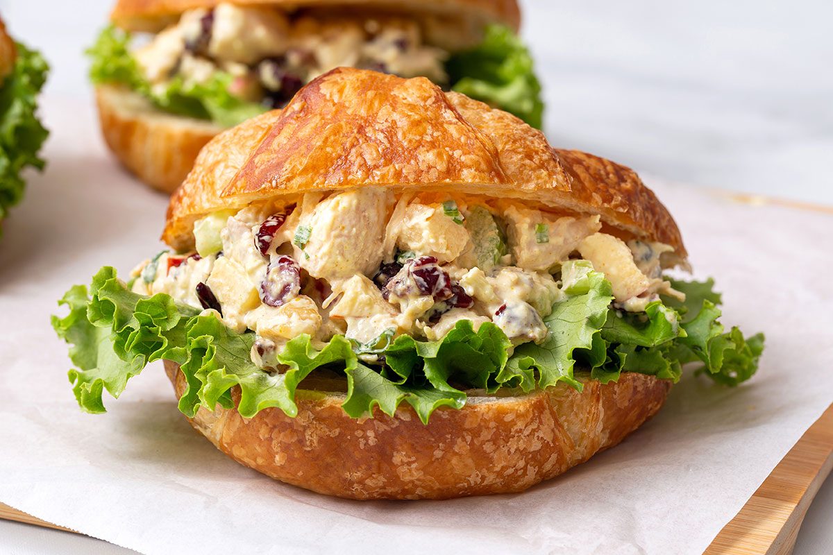 Close up of Curry Chicken Salad on a cutting board