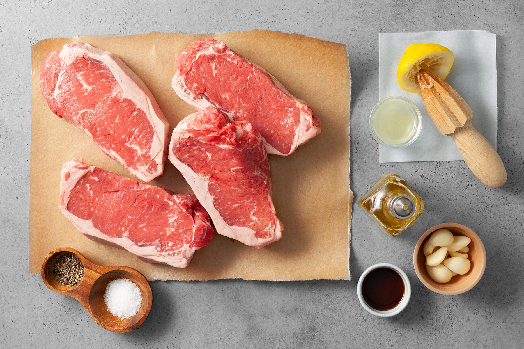 overhead shot of ingredients for garlic grilled steaks