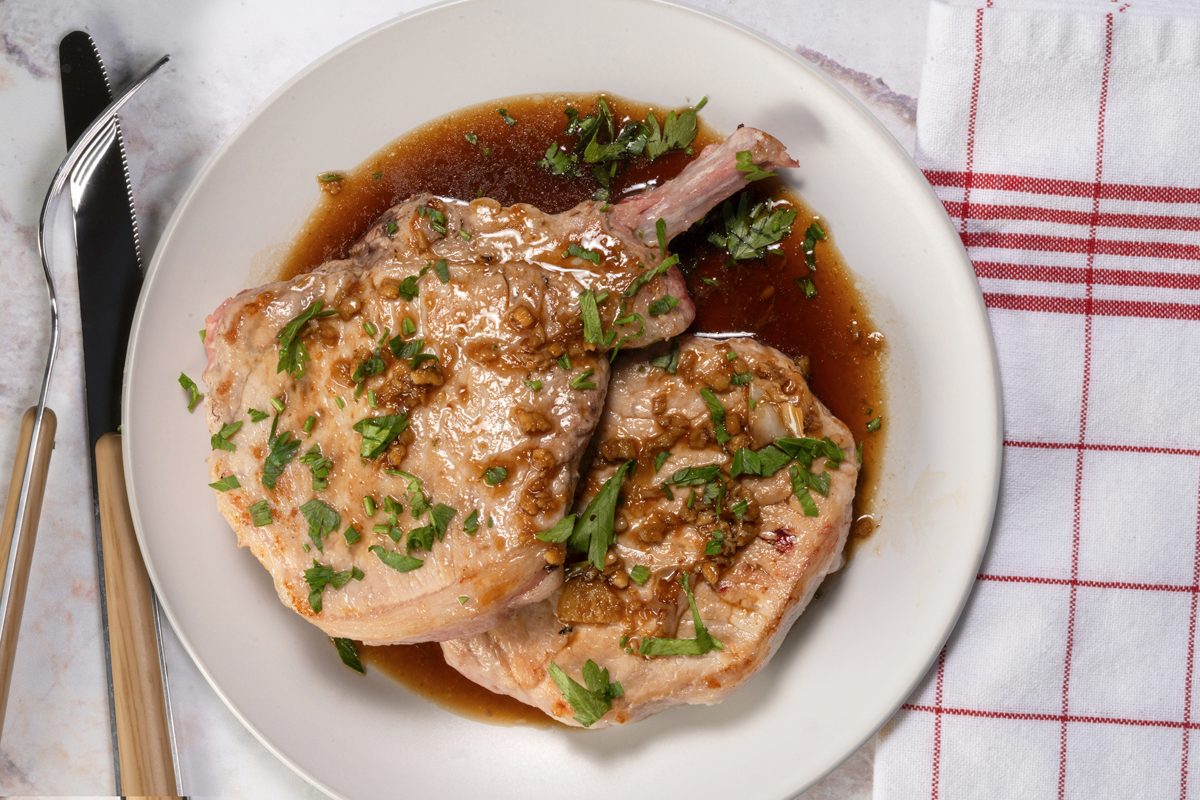 Plating the Pork Chops with the Honey Garlic sauce