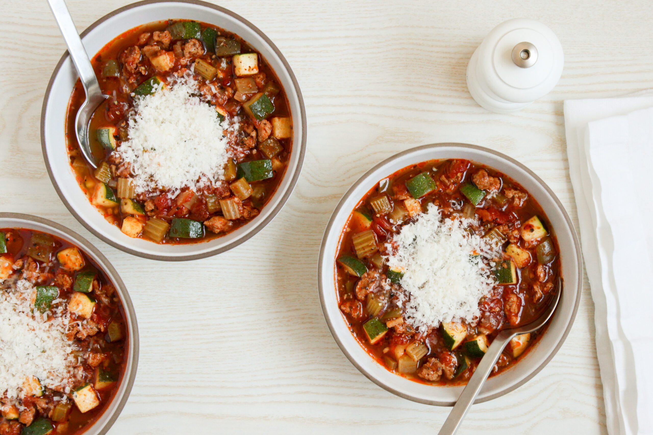 Italian Vegetable Soup garnished with parmesan