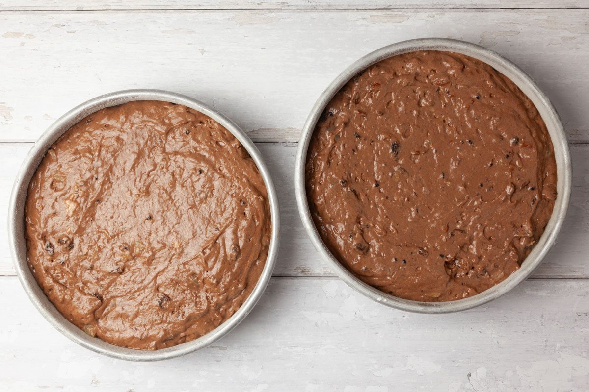 Step 3 of Taste of Home Jam Cake is to spread the batter into two greased and floured 9-inch round cake pans. Bake the cake layers at 350°F for 40 to 455 minutes, or until a toothpick inserted into the center comes out clean. Cool the layers in their pans on a wire rack for 10 minutes, then turn them out of the pans to finish cooling on the wire rack.