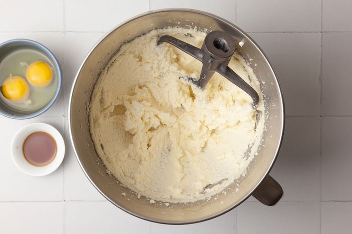 Step 1 of Taste of Home Oreo Cupcakes is to cream the softened butter and sugar until light and fluffy, five to seven minutes. Add the eggs, one at a time, beating well after each addition. Then beat in the vanilla.
