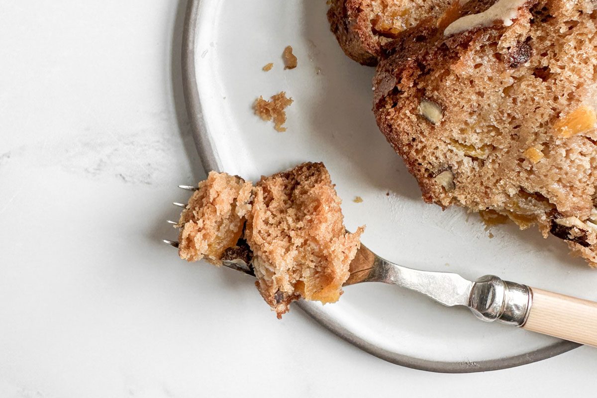 Taste of Home Peach Bread on a ceramic plate