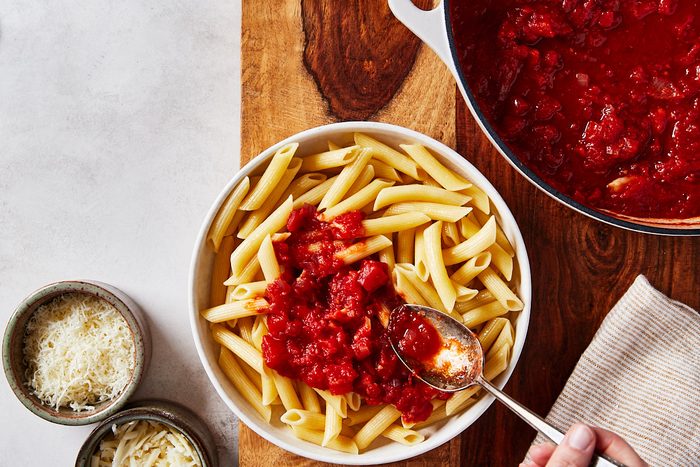 Red Wine Pasta Step 3- spooning sauce onto pasta