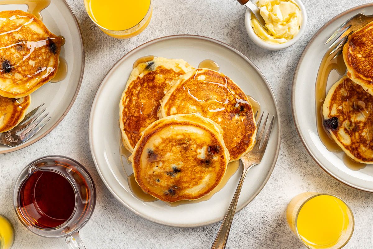 Taste of Home Small Batch Pancakes recipe photo of the finished recipe of pancakes served on plates.