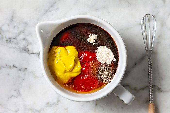 Sauce ingredients in a large container.