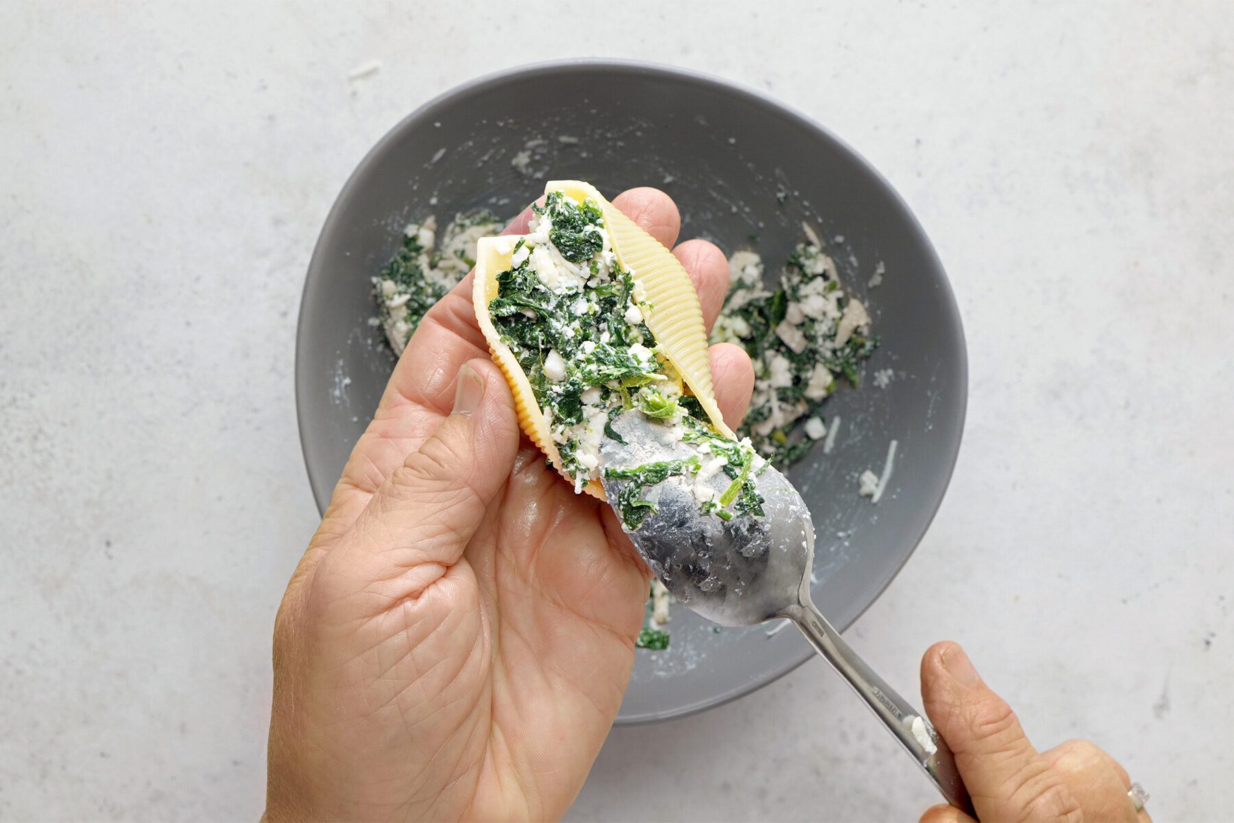 overhead shot of cheese mixture stuffed into pasta