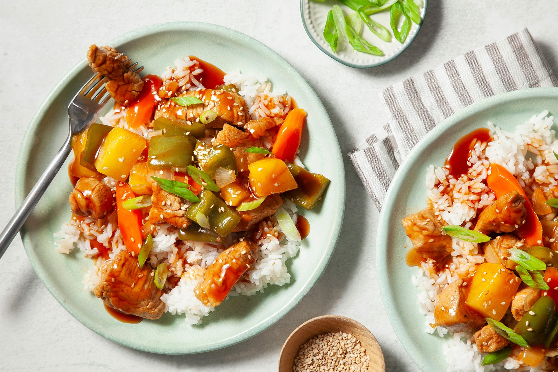 overhead shot of sweet and sour pork with rice