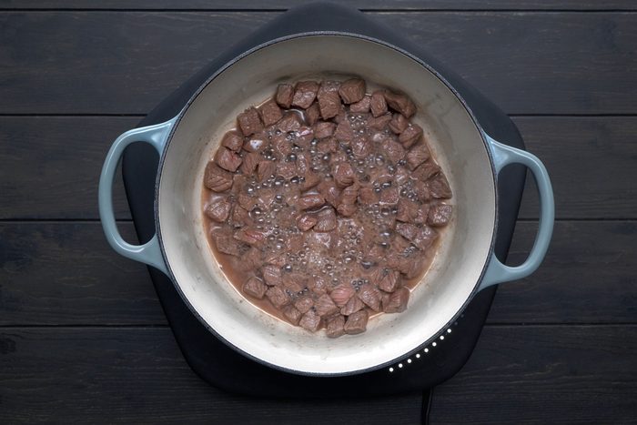 In a large saucepan, heat oil over medium heat, Brown beef on all sides