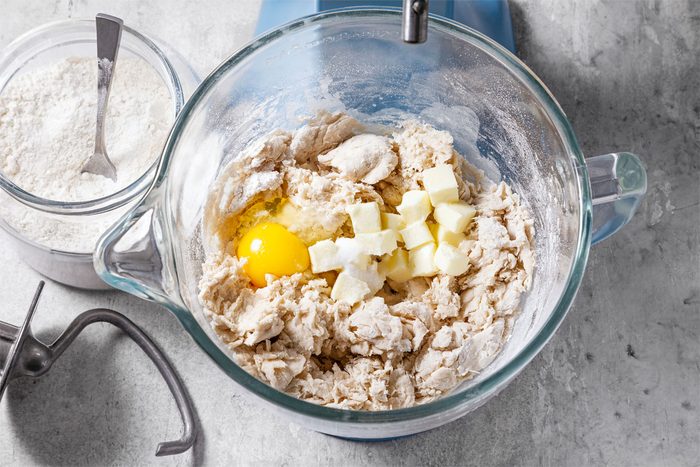 Gradually Mix In 3 2/3 Cups Flour, Egg, Butter And Salt.