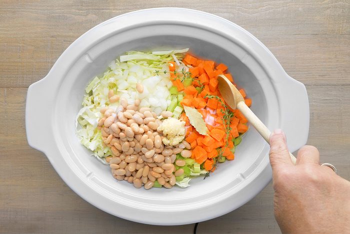 Stir in vegetables, beans, garlic and seasonings.