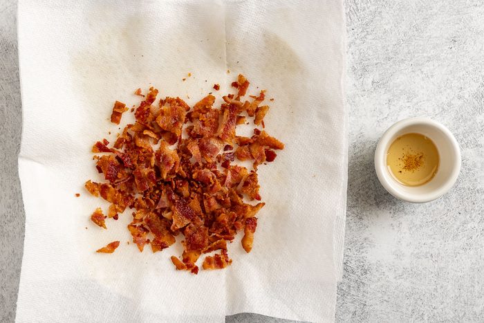 Taste of Home Cowboy Pasta photo of the cooked crumbled bacon and 1 tbs of reserved bacon drippings.