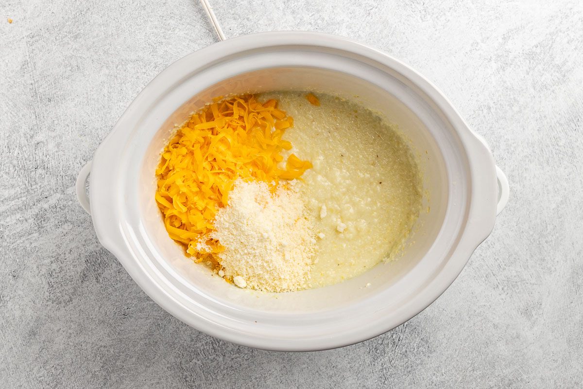 cooked grits with the cheese added in crockpot