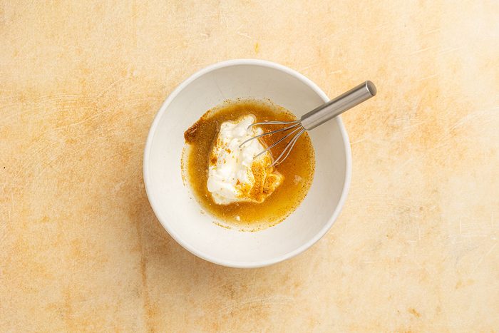 sour cream, lemon juice, lime juice, ground cumin and seasoned salt whisked in a small bowl.