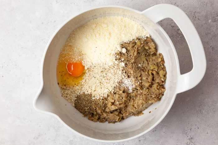 Step 3 of Taste of Home Eggplant Parmesan Meatballs is to combine the rest of the meatball ingredients in a bowl