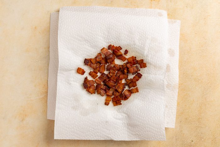 cooked bacon on a paper towel