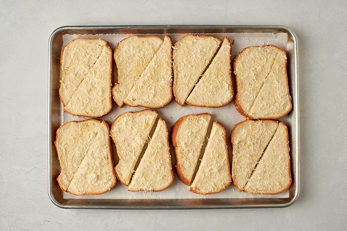 Add toppings to bread