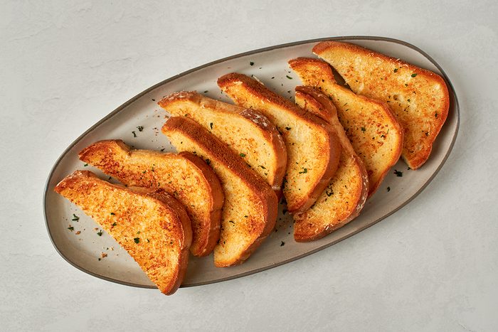 This garlic toast recipe by Taste of Home lets you make garlic bread with plain slices of sandwich bread.