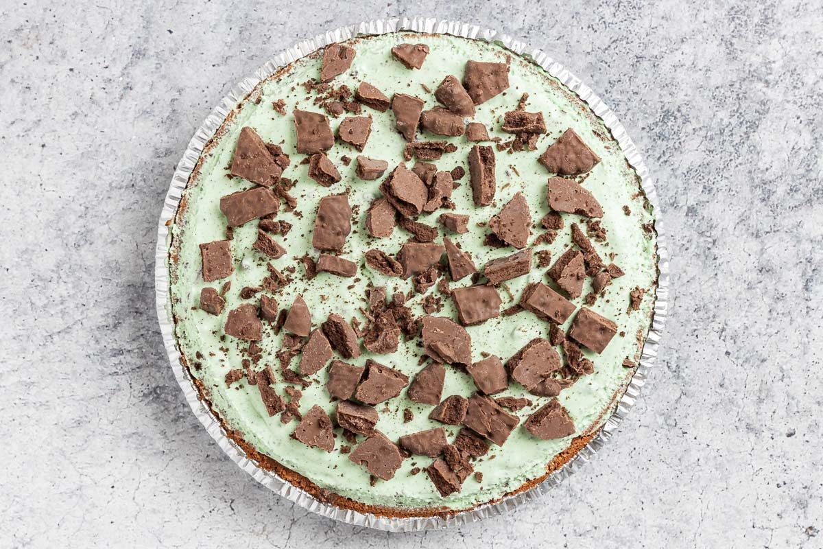 Taste of Home Grasshopper Pie photo of the frozen pie topped with the cookie garnish.