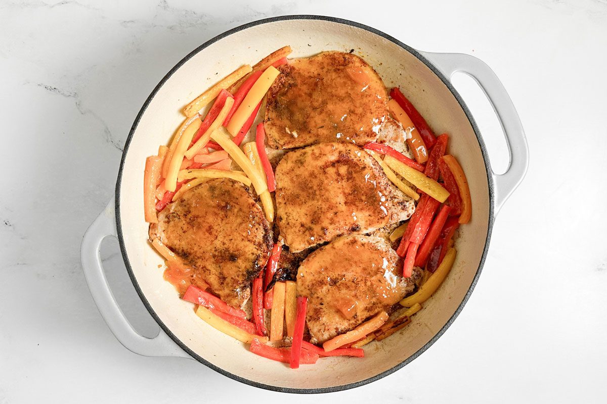 Taste of Home Jamaican Jerk Pork Chops in a ceramic skillet