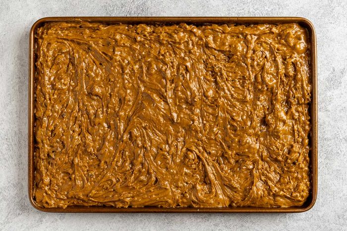 dried and candied fruit added to the batter and spread into the baking sheet.