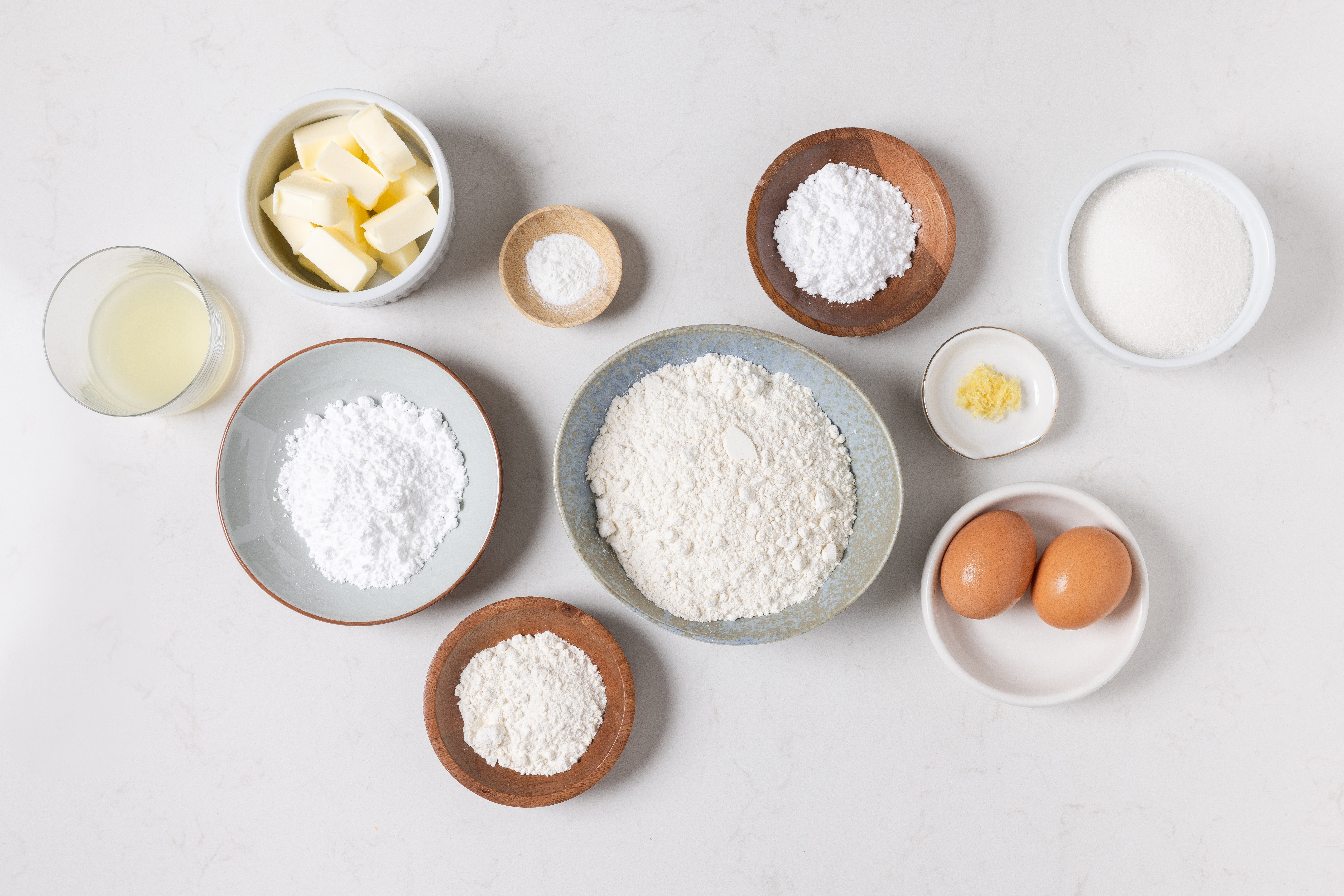 Ingredients for lemon bars on kitchen counter.