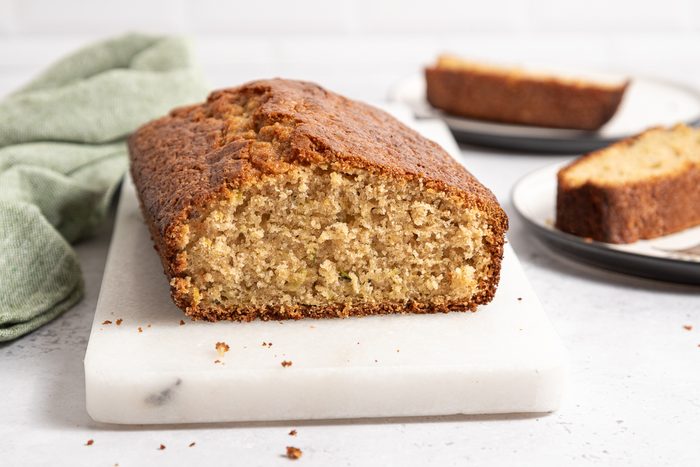 Lemon Zucchini Bread Sliced On Marble Board