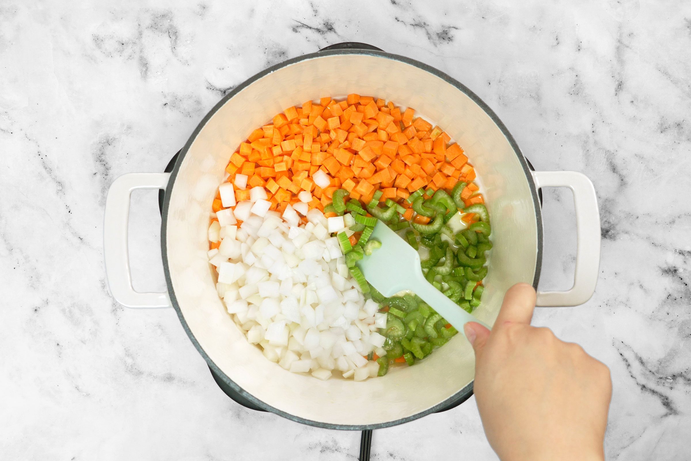 Saute onions, carrot and celery in oil and butter