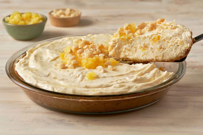 A close-up shot of the Pineapple Pie filling, highlighting the creamy texture and crushed pineapple on top.