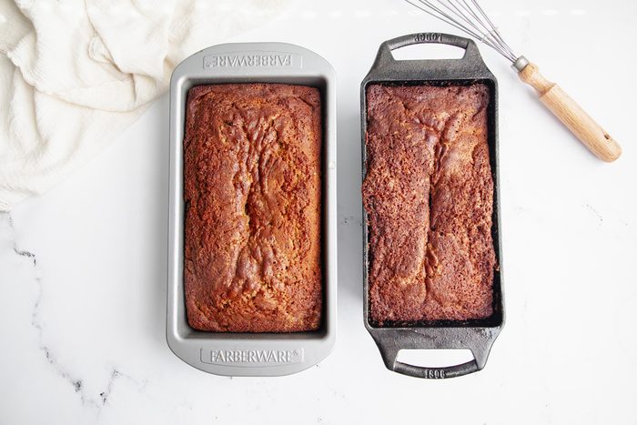 Overhead shot for Taste of Home Pumpkin Raisin Bread, ingredients in two bread baking dishes after baked.