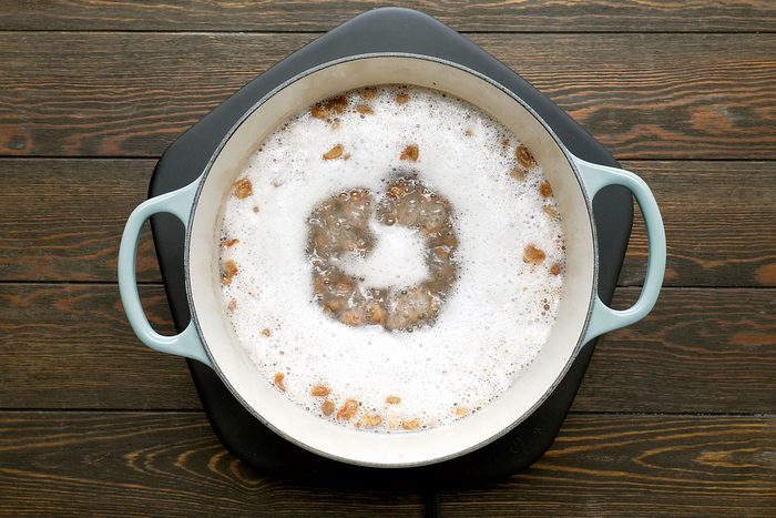 Bringing beans to boil and simmer in a dutch oven
