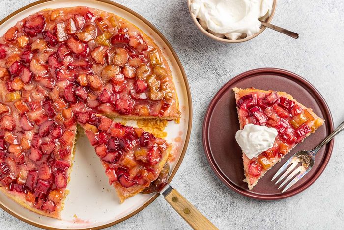 the finished Rhubarb Upside Down Cake cut into slices and served on plates.