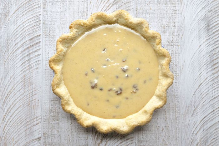Custard poured into pie crust.