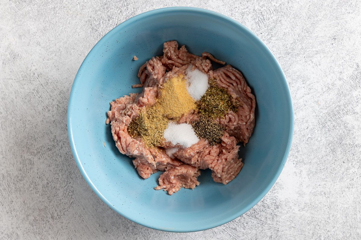 Taste of Home Turkey Italian Sausage photo of the ingredients in a mixing bowl.