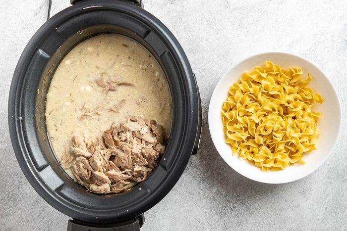 sour cream stirred into the crockpot along with the shredded turkey.