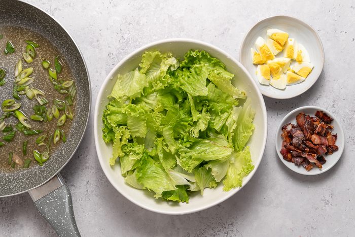 Bowls With Lettuce, Boiled Eggs And Cooked Bacon