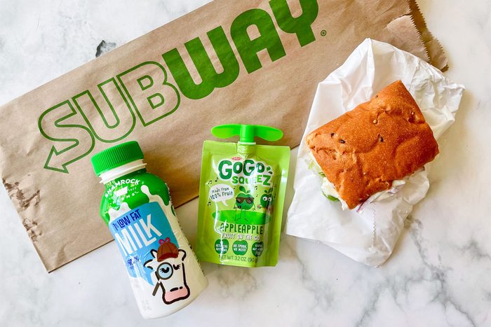 Subway Fast Food Kids Meal items arranged on marble kitchen counter