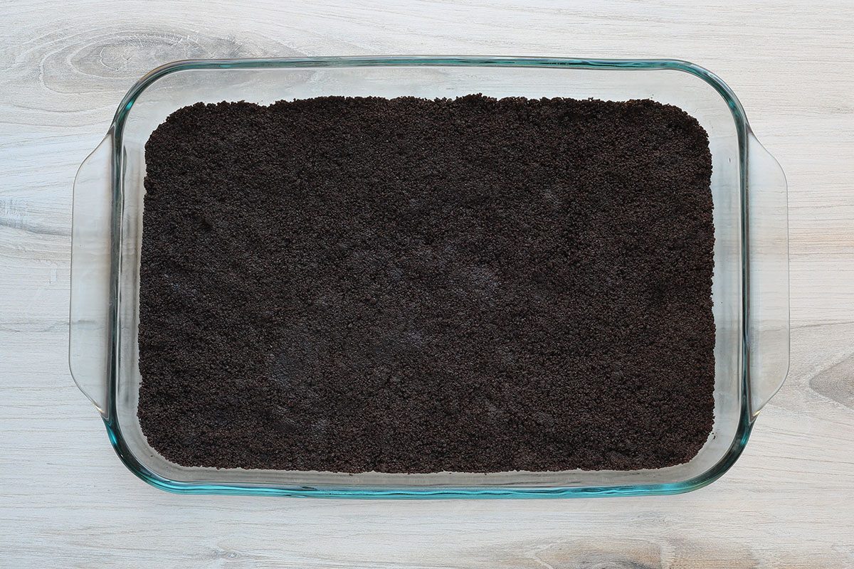 Oreo cookie crumbs form the crust for this layered candy cand dessert.