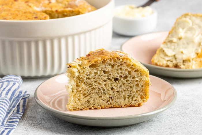 Taste of Home Dill Bread photo of the finished recipe cut into slices and placed on plates.