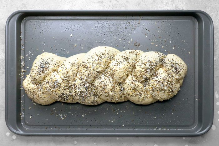 salt, onion and the three seeds combined and sprinkled over bread