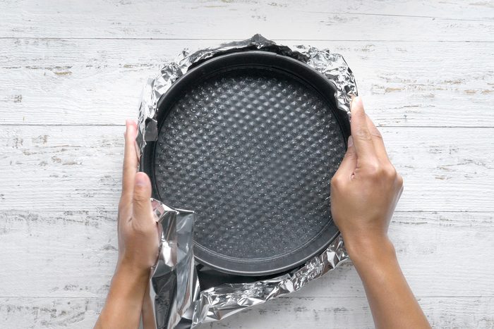 Securely wrap foil around pan
