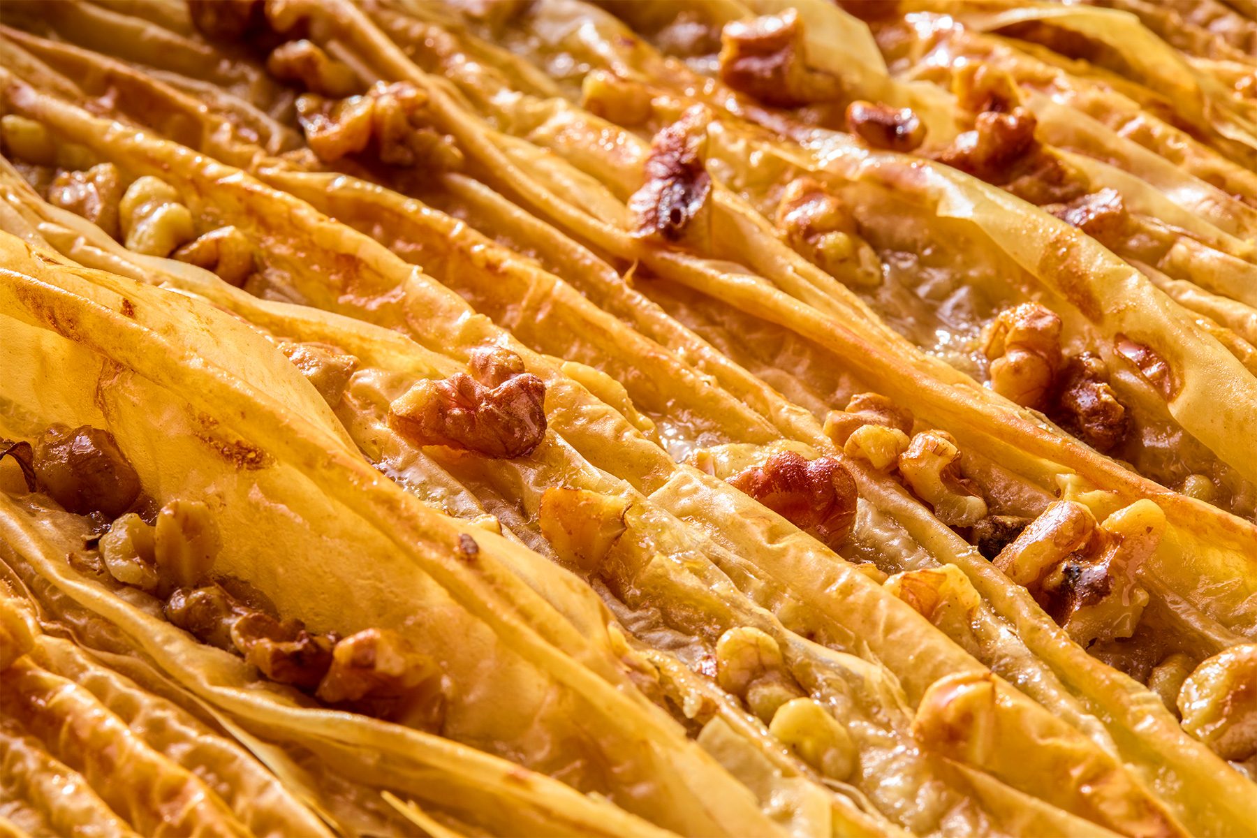 close shot of phyllo crinkle cake in a baking dish
