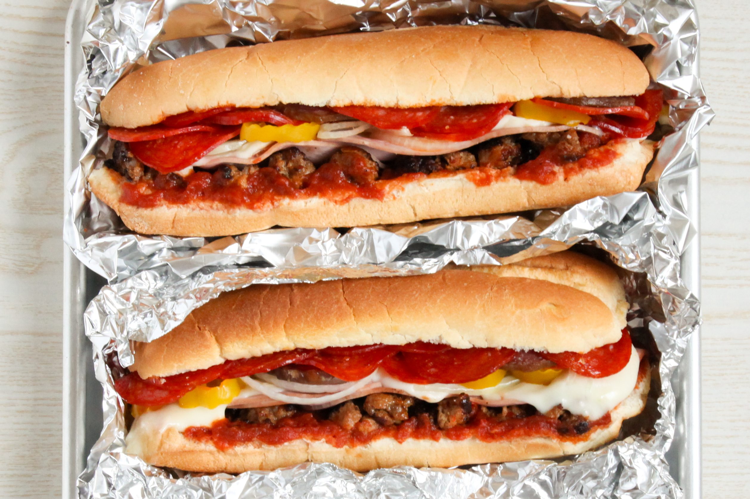 Pizza Subs in foil, ready to warm