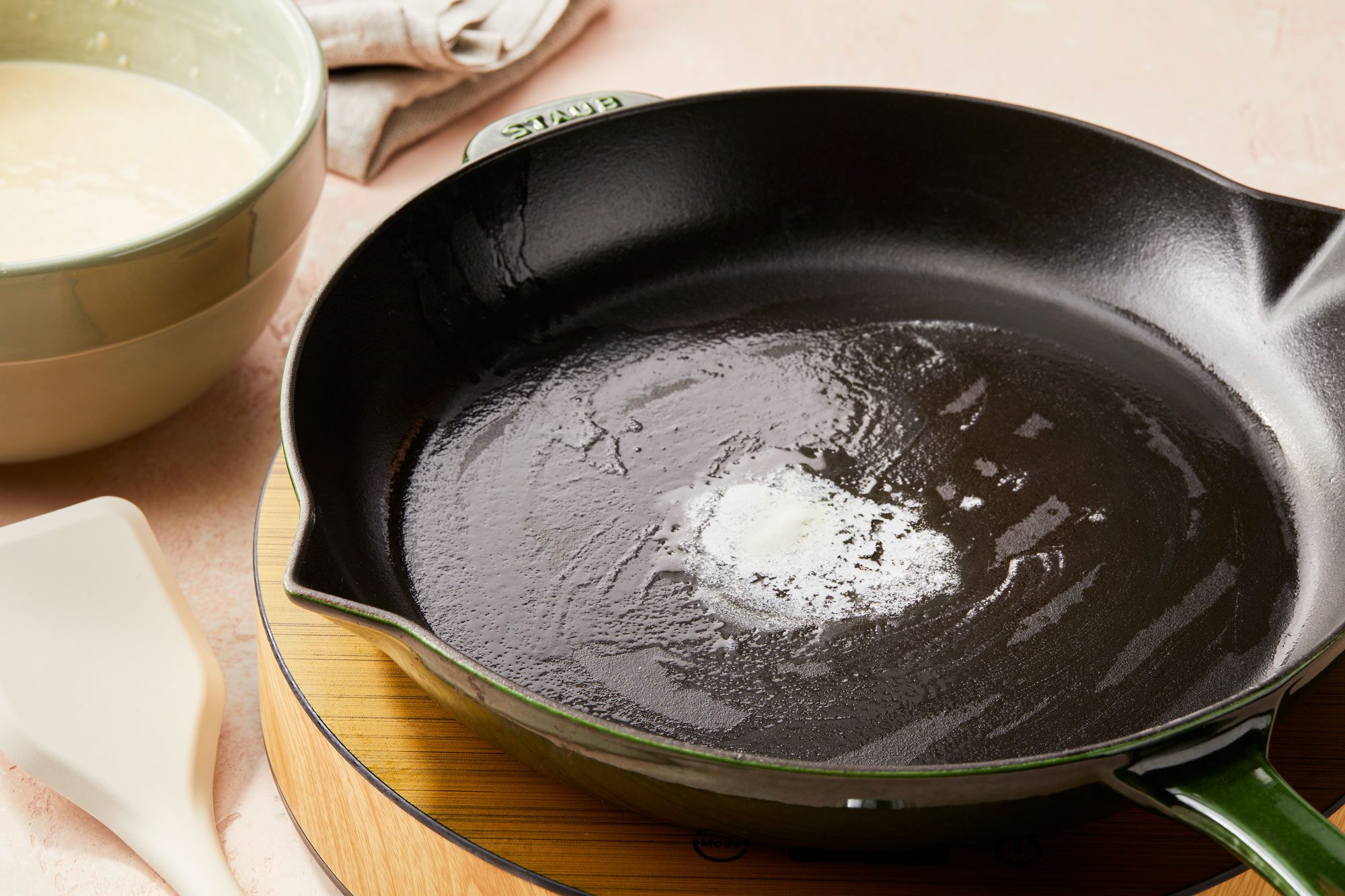 Swirl a small amount of butter in a large skillet over medium-high heat