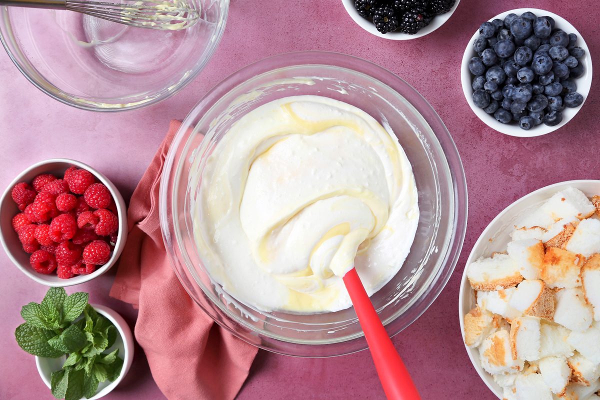 yogurt, cream cheese, sour cream and vanilla beat together in a bowl